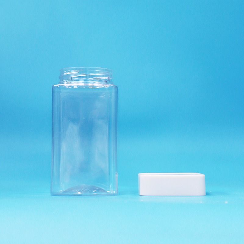 Transparante vierkante lege PET-plastic voedselpot voor snoep, koekjes, jam, witte deksel