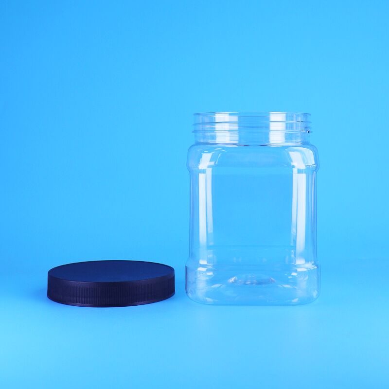 850 ml voedselveilige PET heldere vierkante op maat gemaakte plastic verpakkingspotten met schroefdeksel voor gedroogd fruit