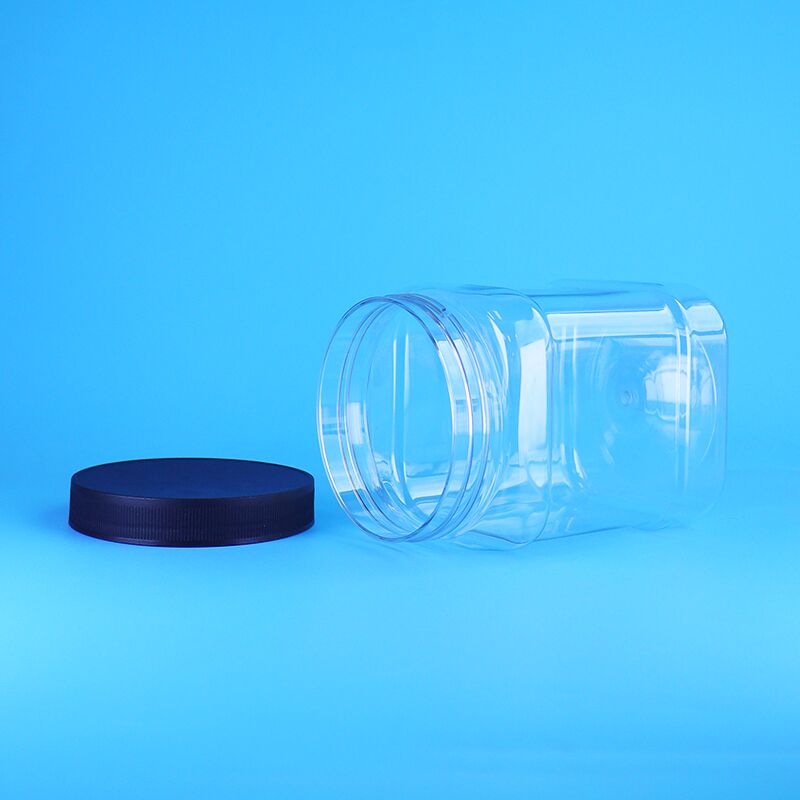 850 ml voedselveilige PET heldere vierkante op maat gemaakte plastic verpakkingspotten met schroefdeksel voor gedroogd fruit